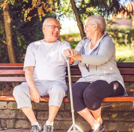 senior couple in a bench outdoors